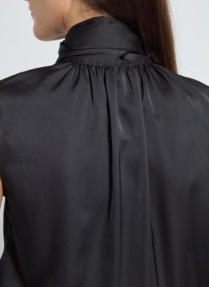 black blouse with neck scarf