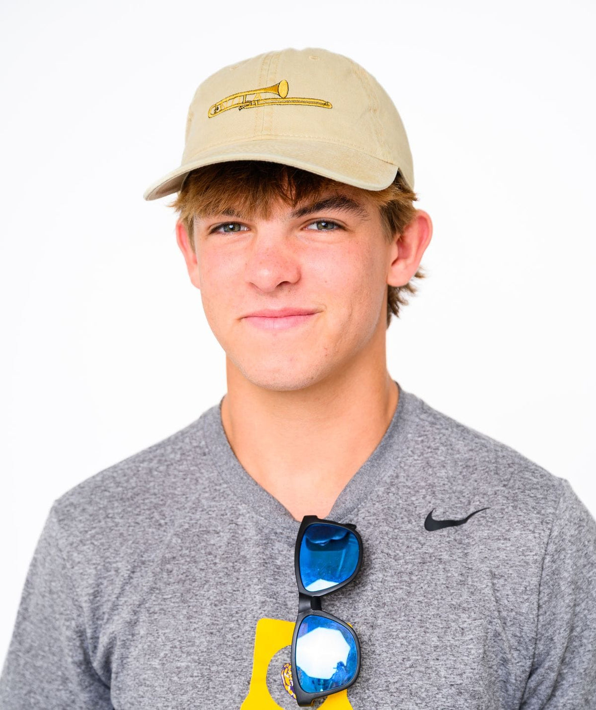 beige trombone baseball cap