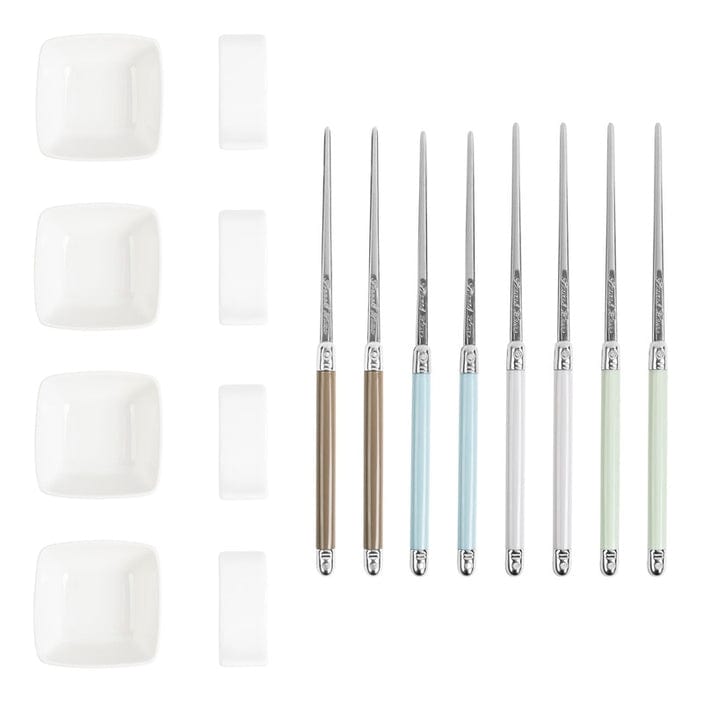 A set of mother of pearl chopsticks with ceramic bowls