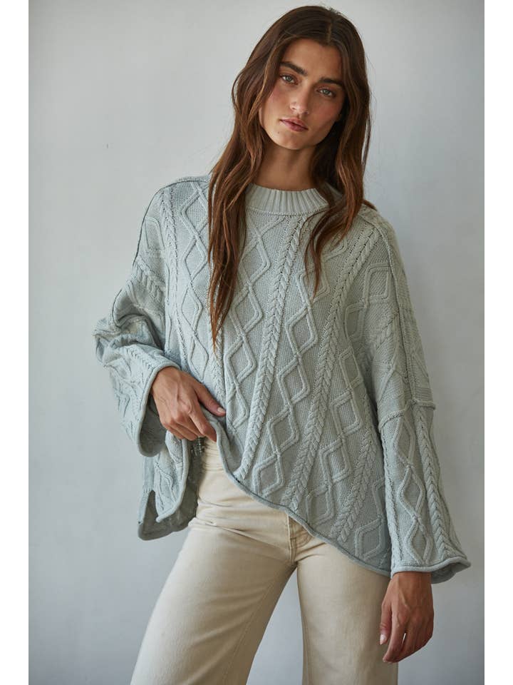 cable knit sweater in light blue with side slits