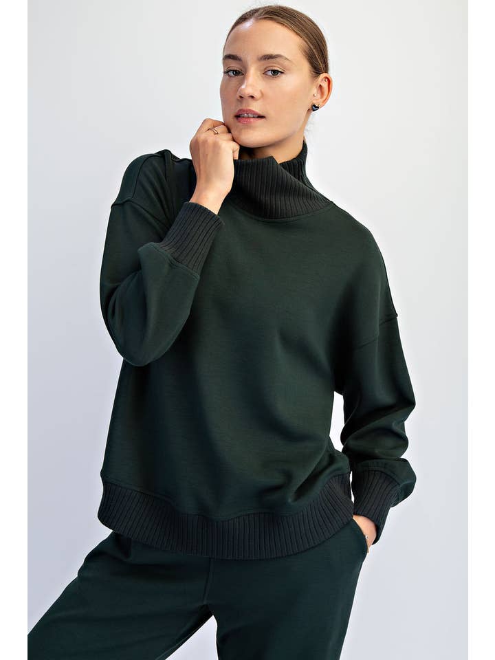 green turtleneck pullover