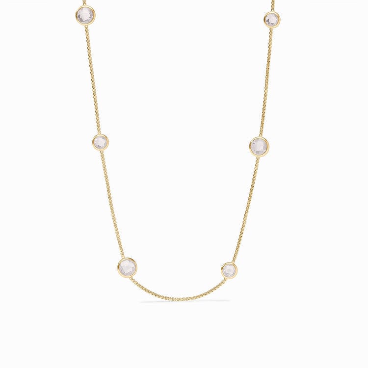 Gold necklace with pearl-like statement pieces