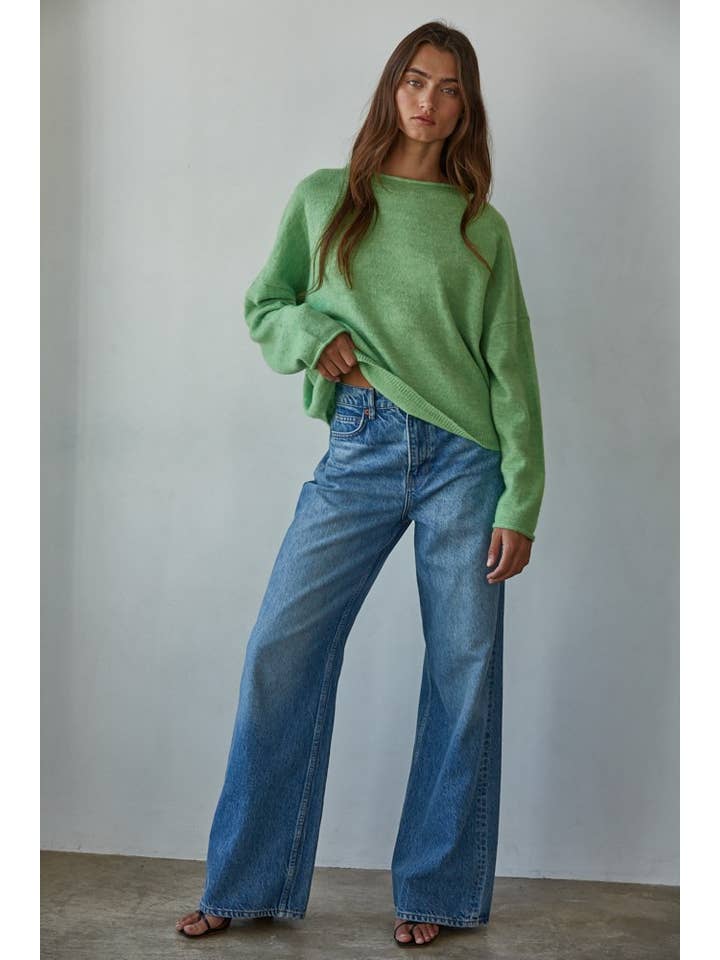 green ribbed sweater