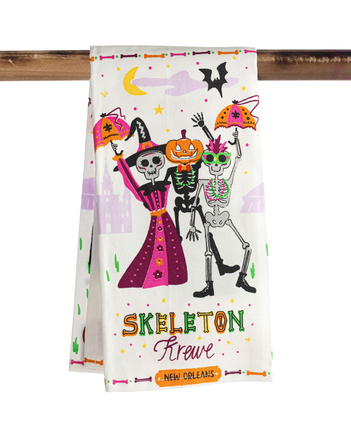 Halloween-themed towel with skeletons and pumpkins