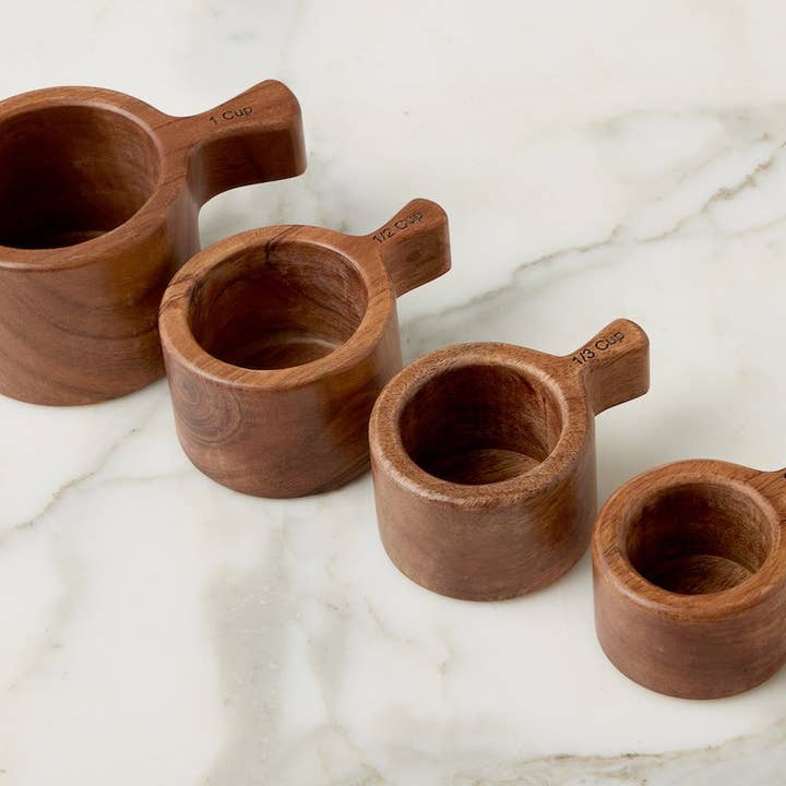 Set of four wooden measuring cups