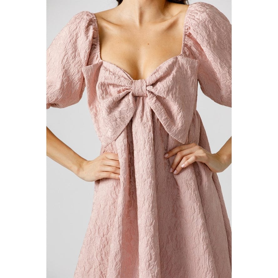 all wrapped up bow babydoll mini dress Storia Babydoll Swing Mini Dress with Bow Detail