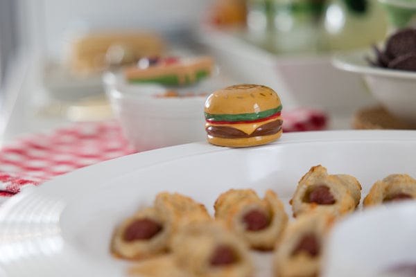 nora fleming for the bun of it topper