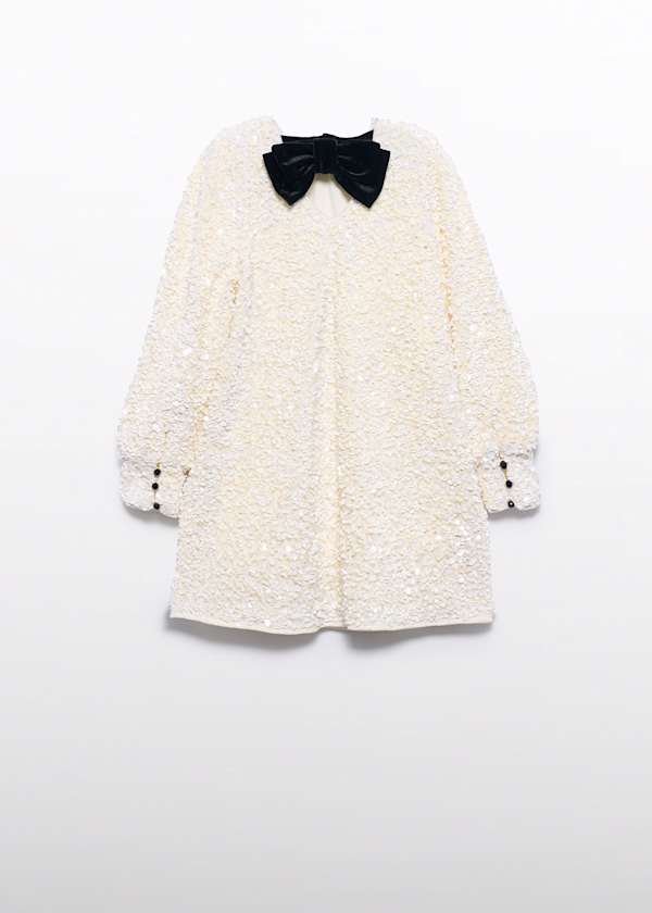 sequin dress with black velvet bow in back