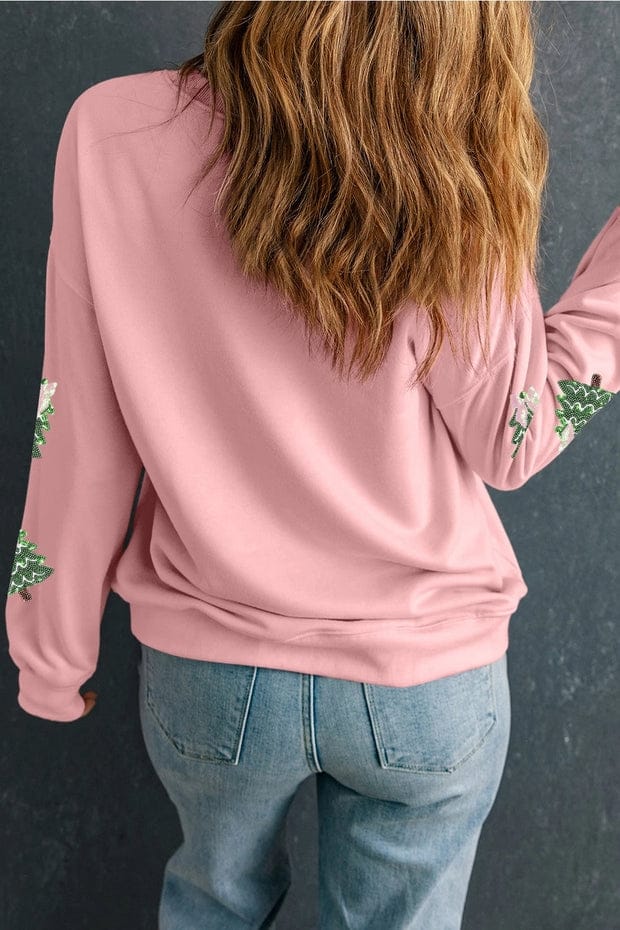 back of pink sequin tree sweater