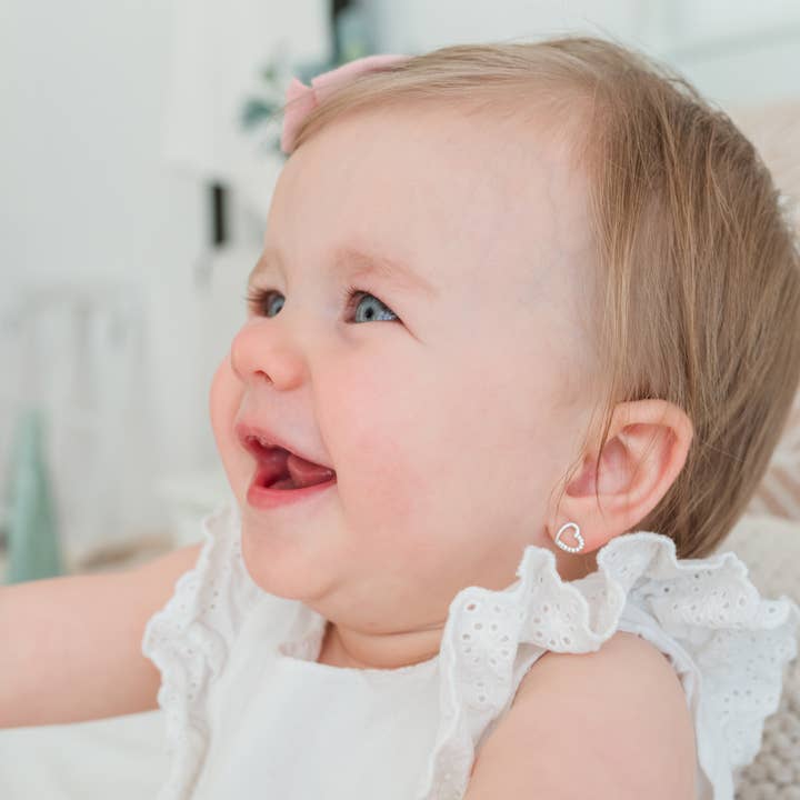 silver heart stud earrings with pink jewels