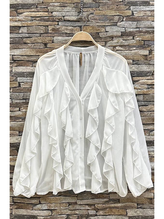 white ruffle blouse