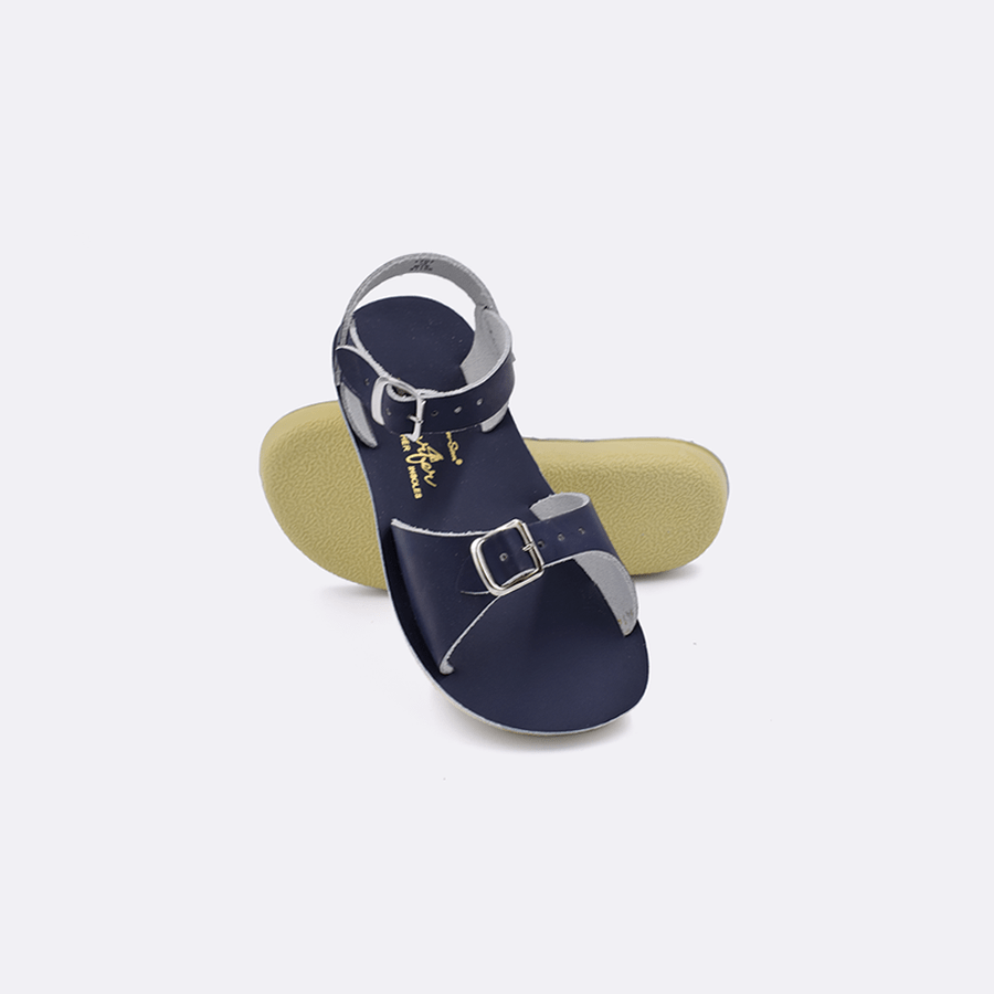 Double strap, rubber sole, leather surfer sandal by Saltwater Sandals in navy for children sizes five through twelve.