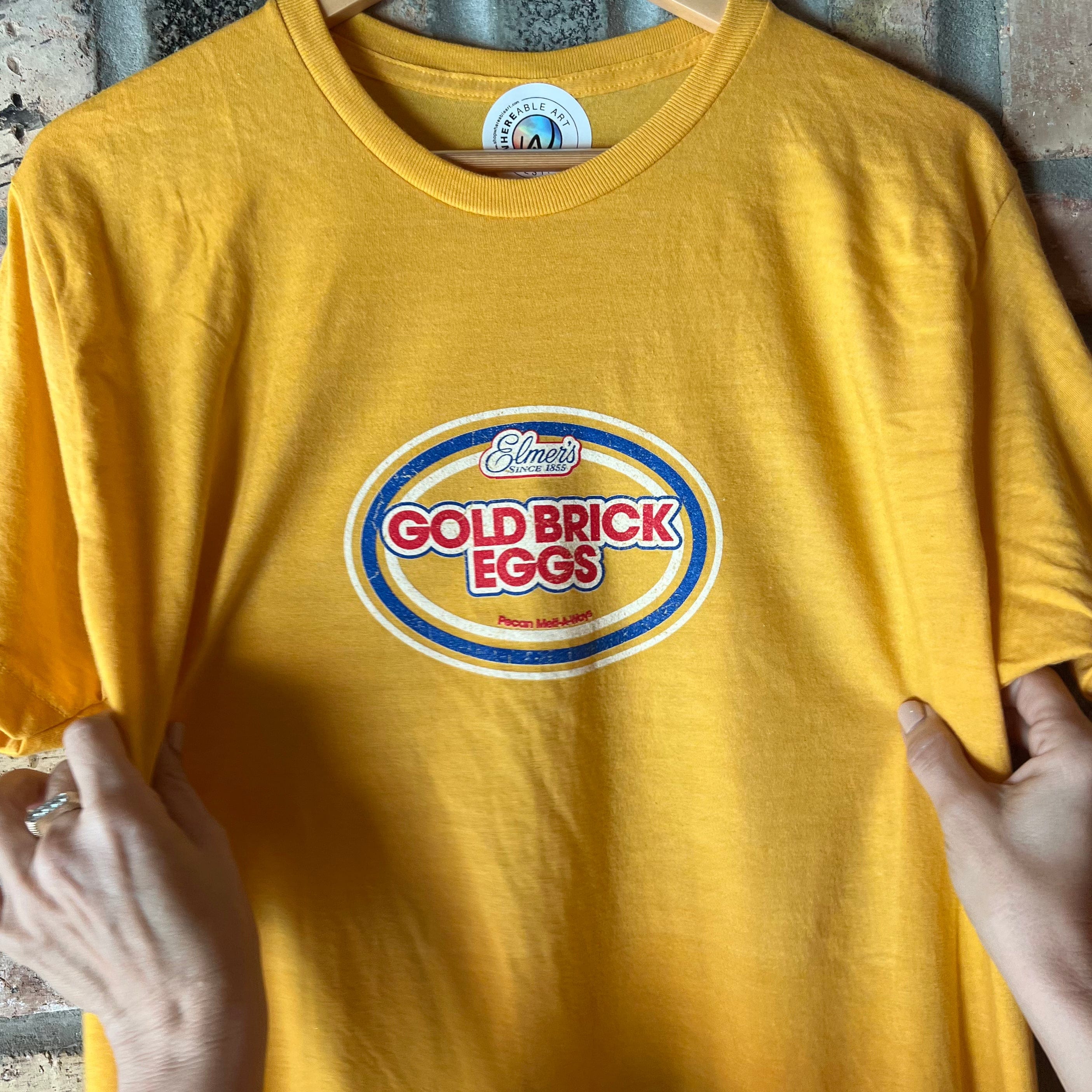 Whereable Art Elmer's Gold Brick Egg Unisex T-Shirt - Little Miss Muffin Children & Home