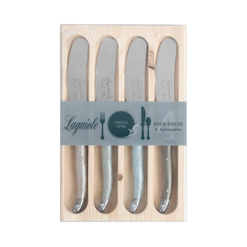 Set of four silver spreaders in a wooden box with Laguiole branding.