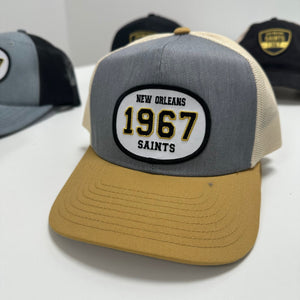 Whereable Art Whereable Art Saints Retro 1967 Grey/Gold Trucker Cap - Little Miss Muffin Children & Home