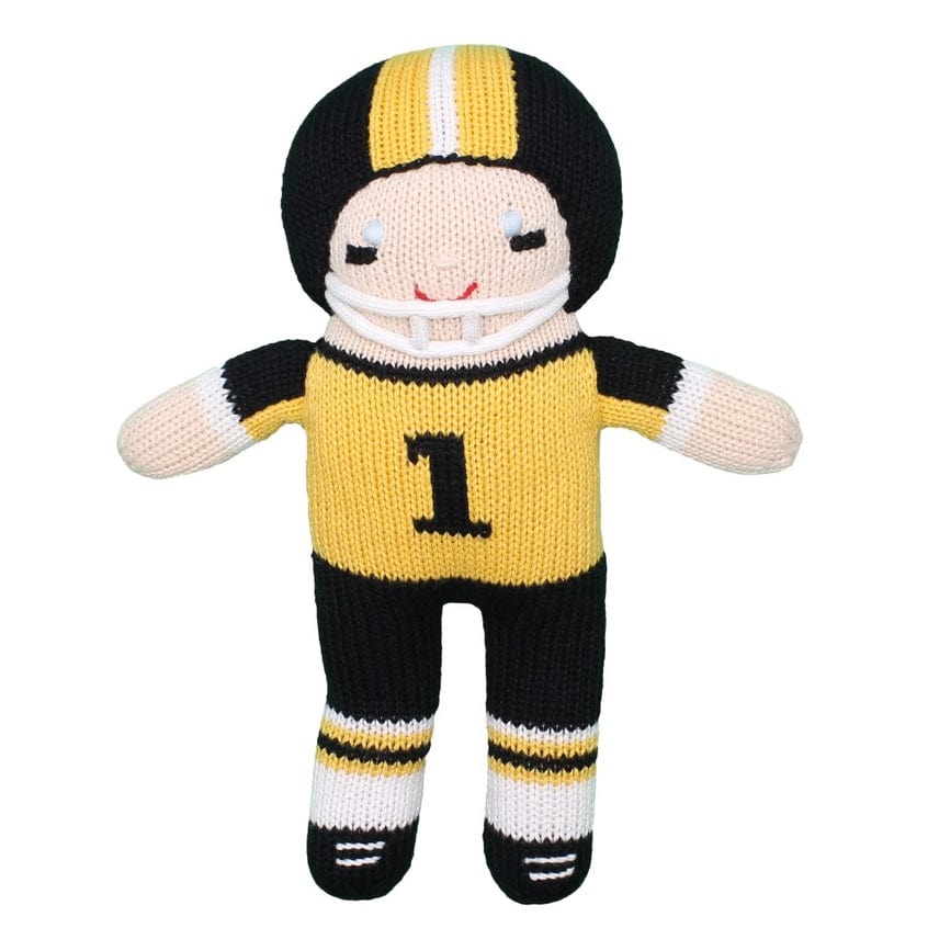 black and gold football player toy