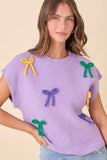 Main Strip Mardi Gras Bow Knit Top