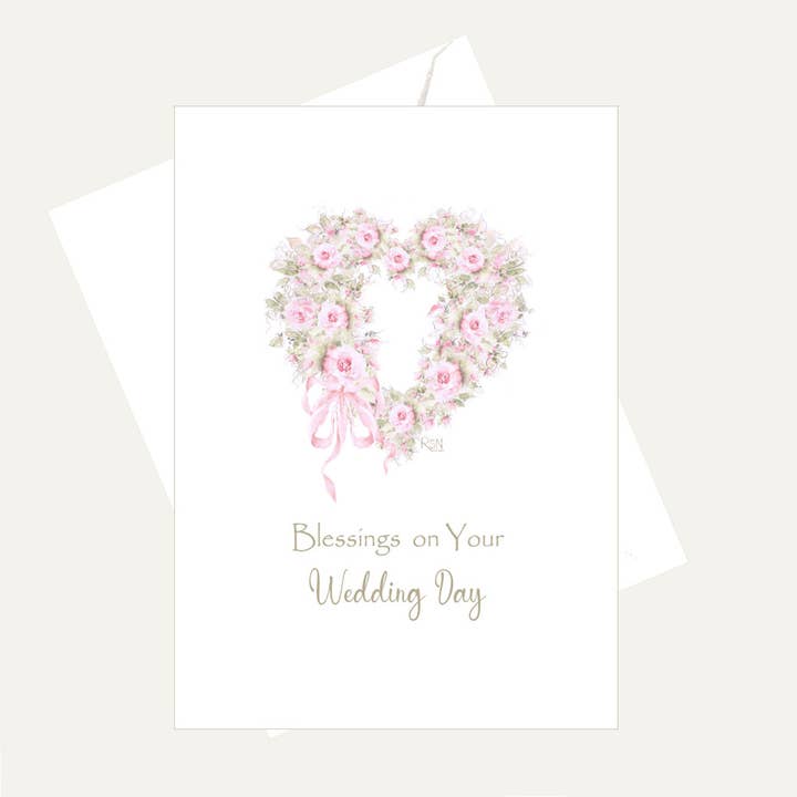 Card with floral heart design and 'Blessings on Your Wedding Day' text on a white background
