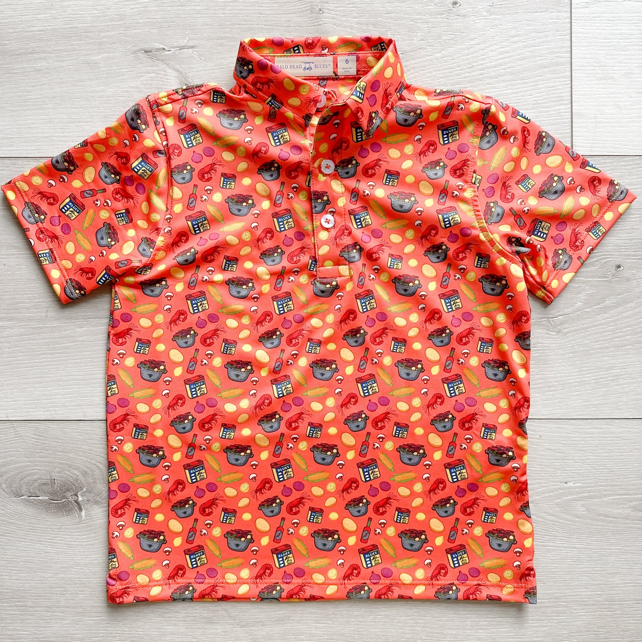Crawfish Boil All-Over Print on Coral Youth Albatross Polo