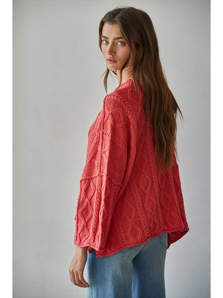 red cable knit sweater