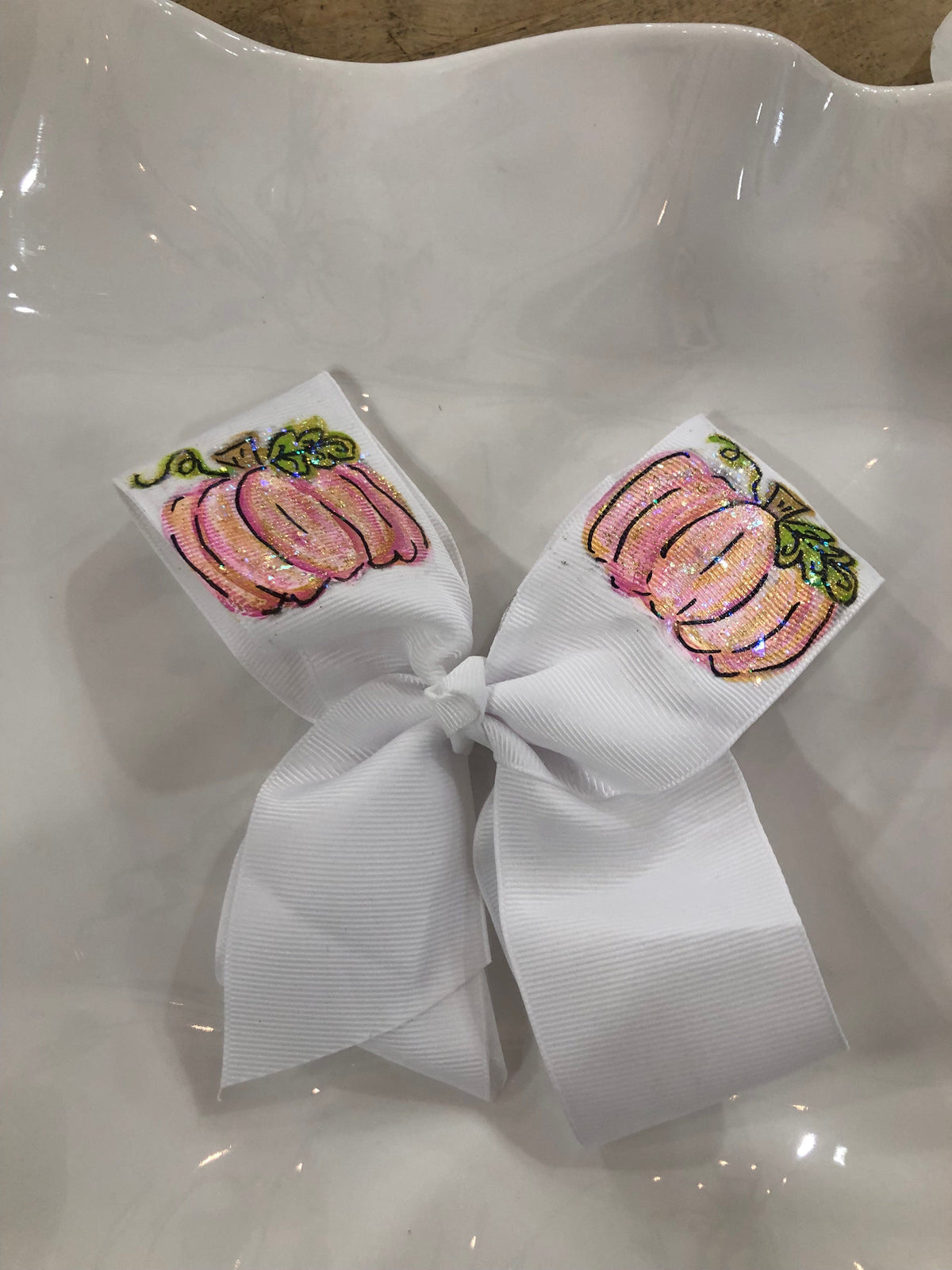 pink painted pumpkin bow