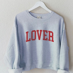 Oat Collective Lover Cropped Graphic Sweatshirt in Light Blue