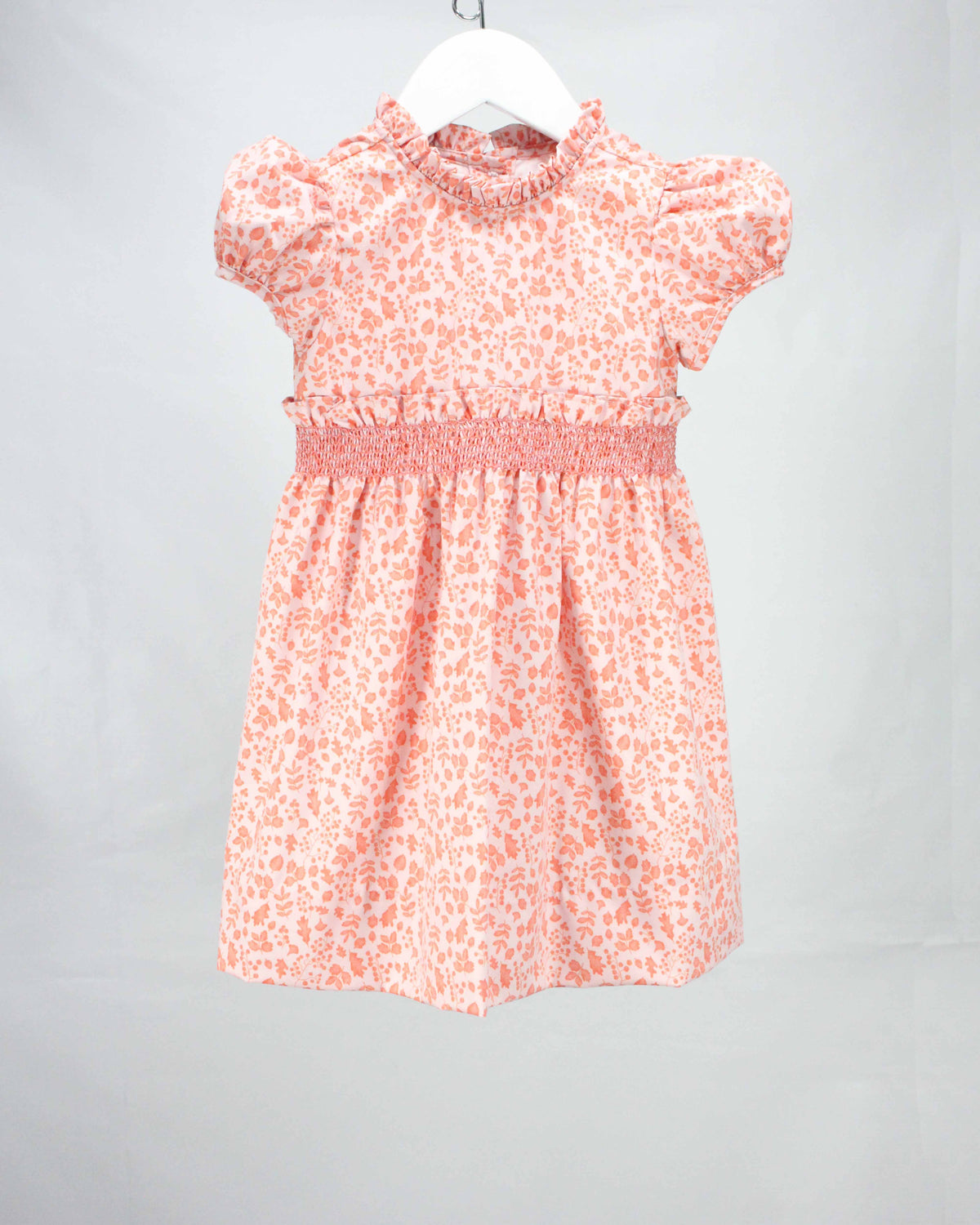 pink and orange smocked fall floral dress