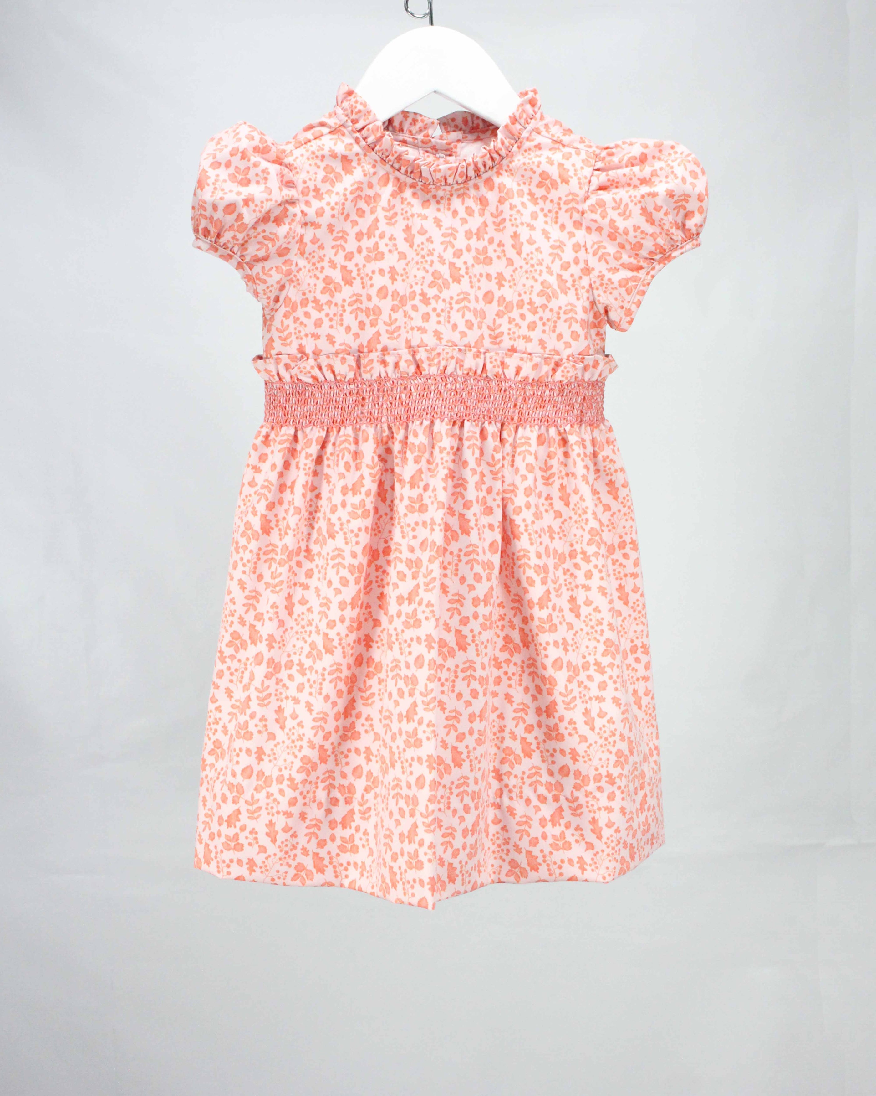 pink and orange smocked fall floral dress