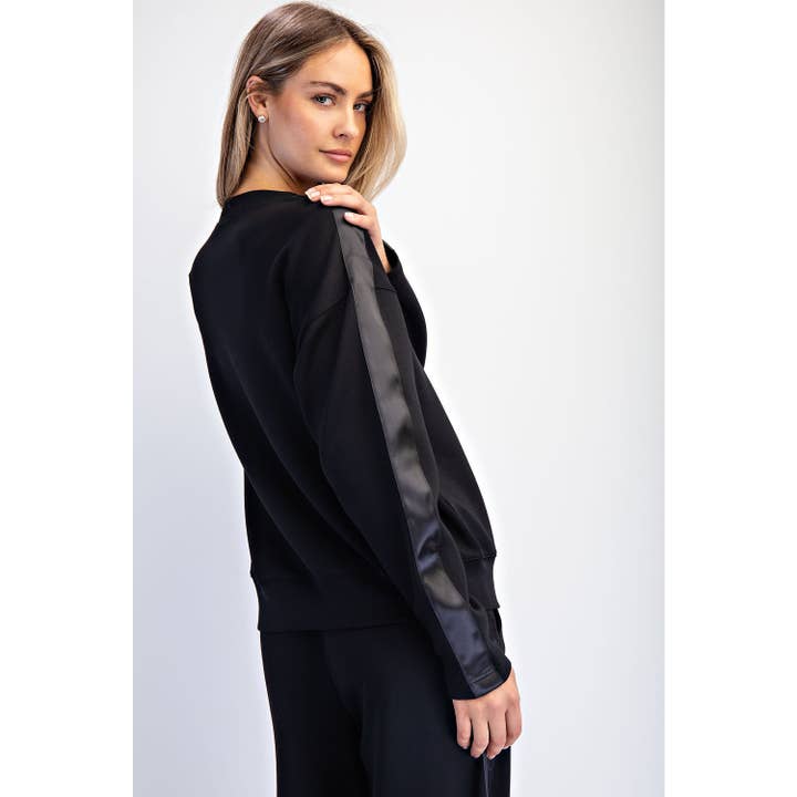 black sweater with satin stripe down the arm