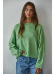 green boat neck sweater