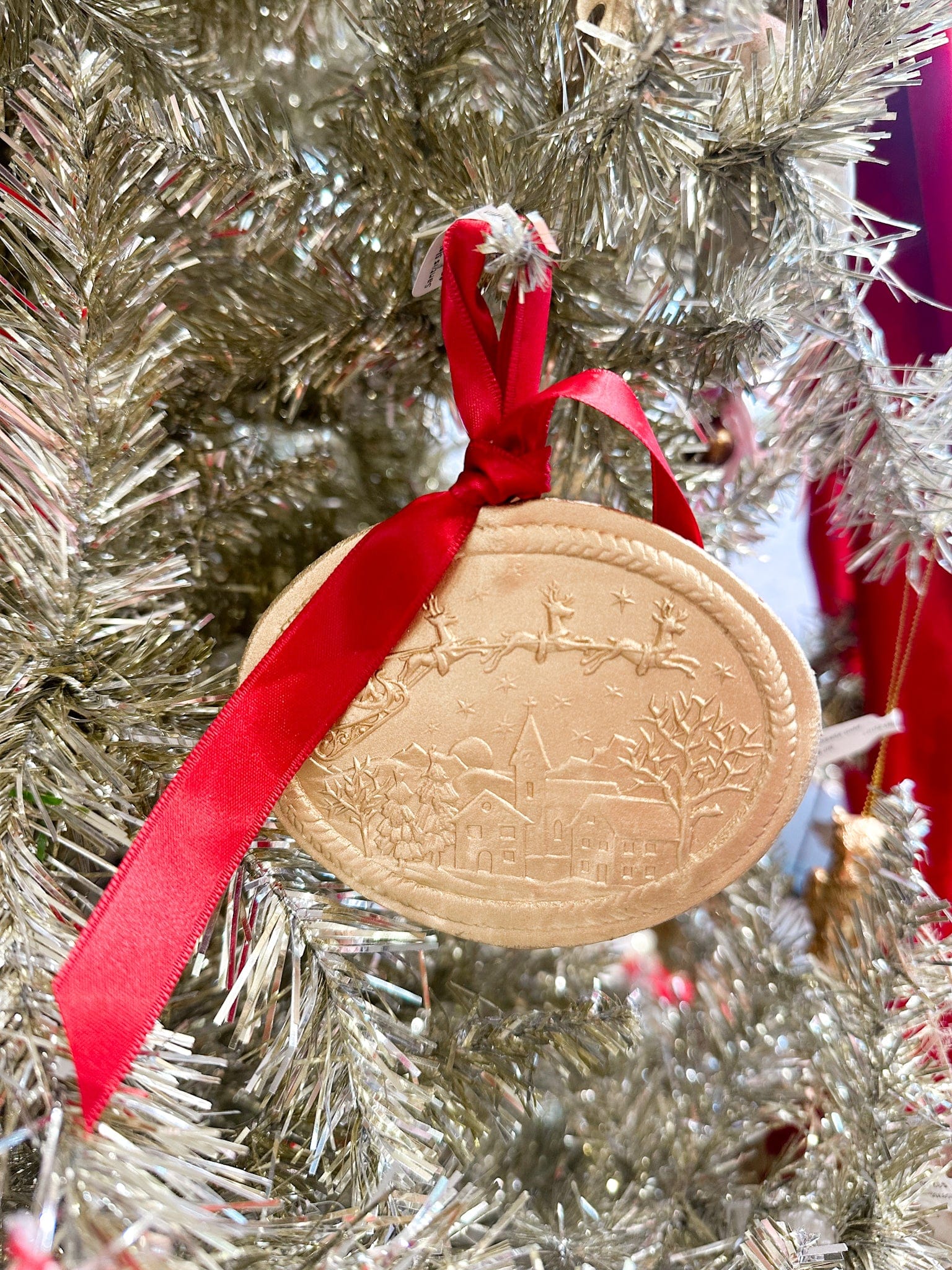 Santa on his sleigh gold ornament for tree 