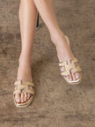 The Ena Gold H Cutout Raffia Slide