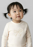 baby cream t shirt with holiday bow
