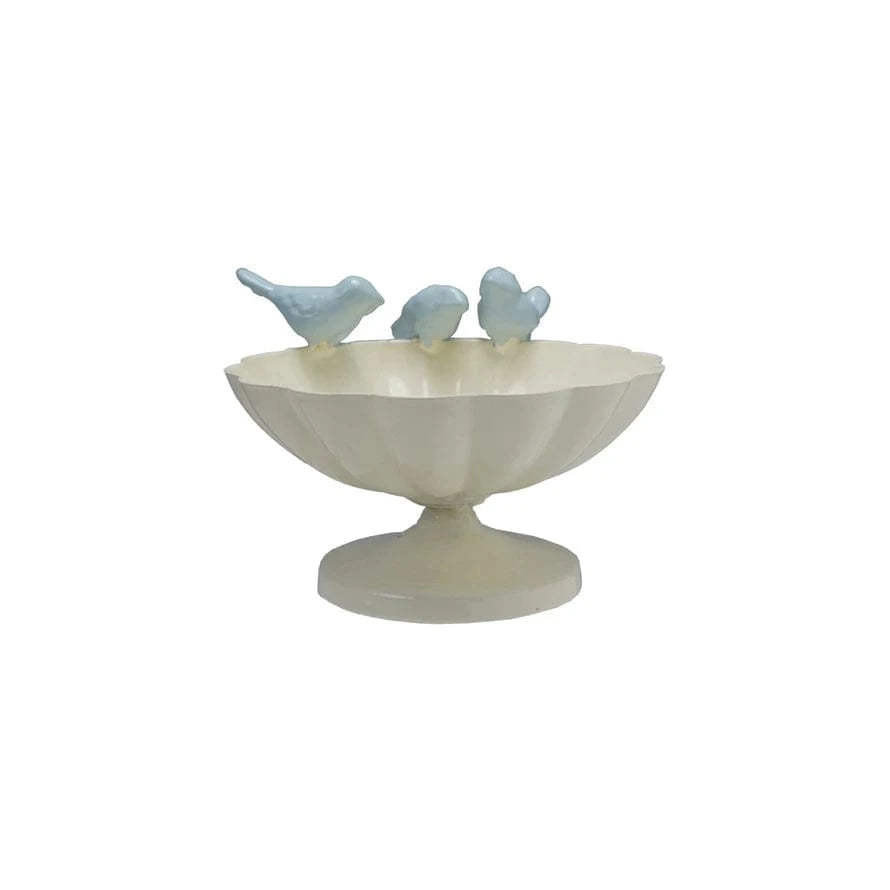 Decorative bowl with three small bird figurines 