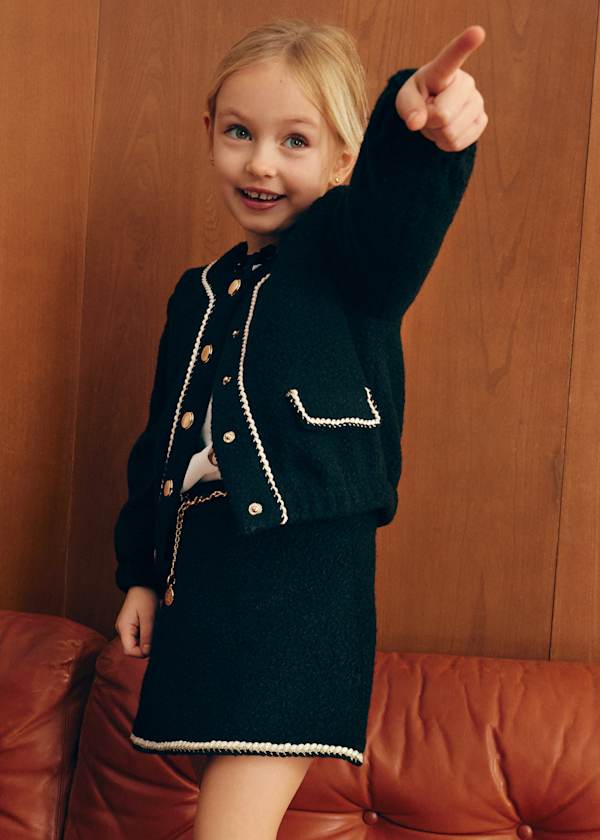 black girls mini skirt with chain belt