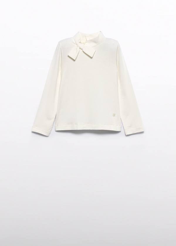 white turtleneck with bow tie