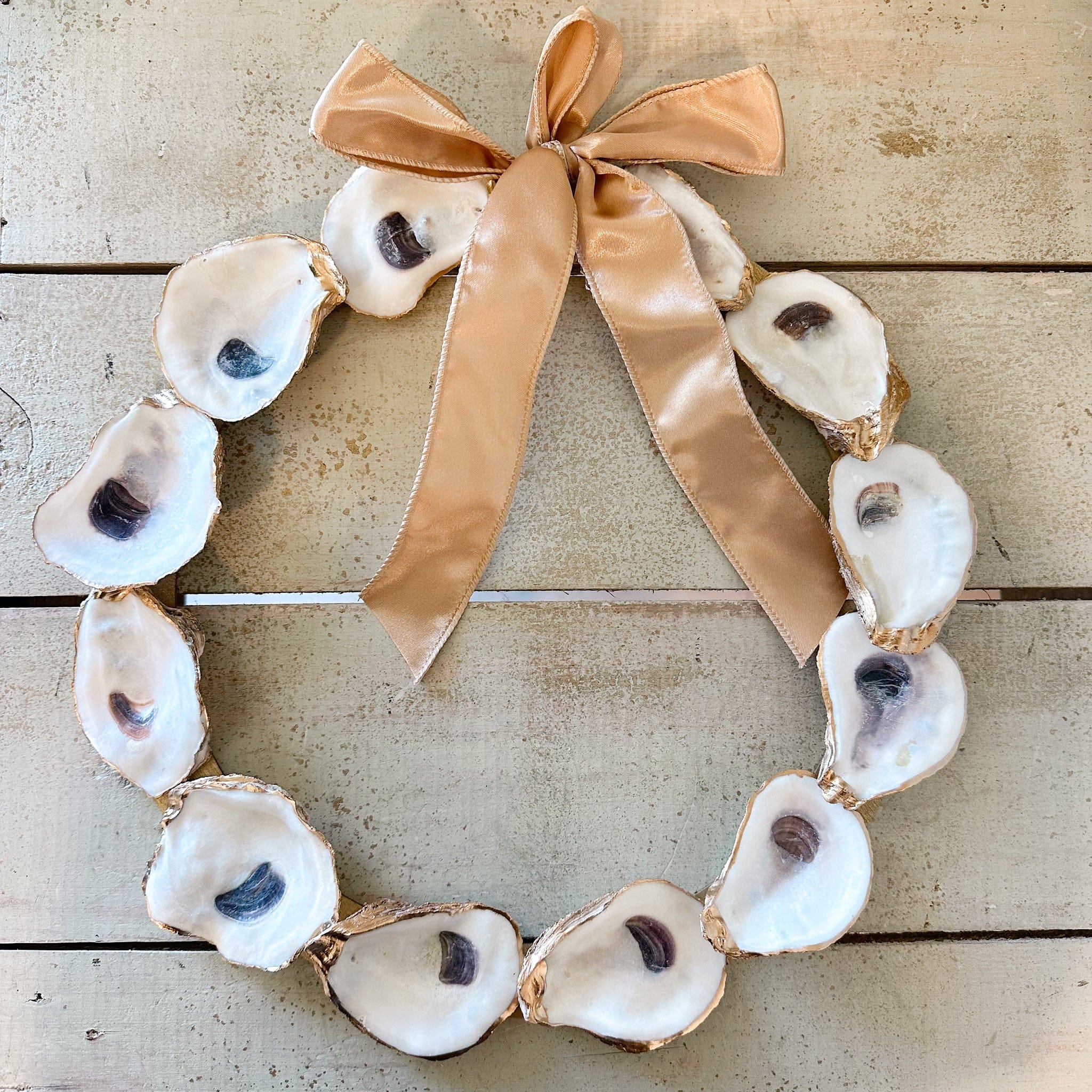 gold ribbon oyster wreath 