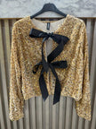 gold sequin cardigan with bows