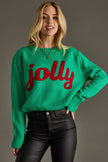 green sweater with red jolly