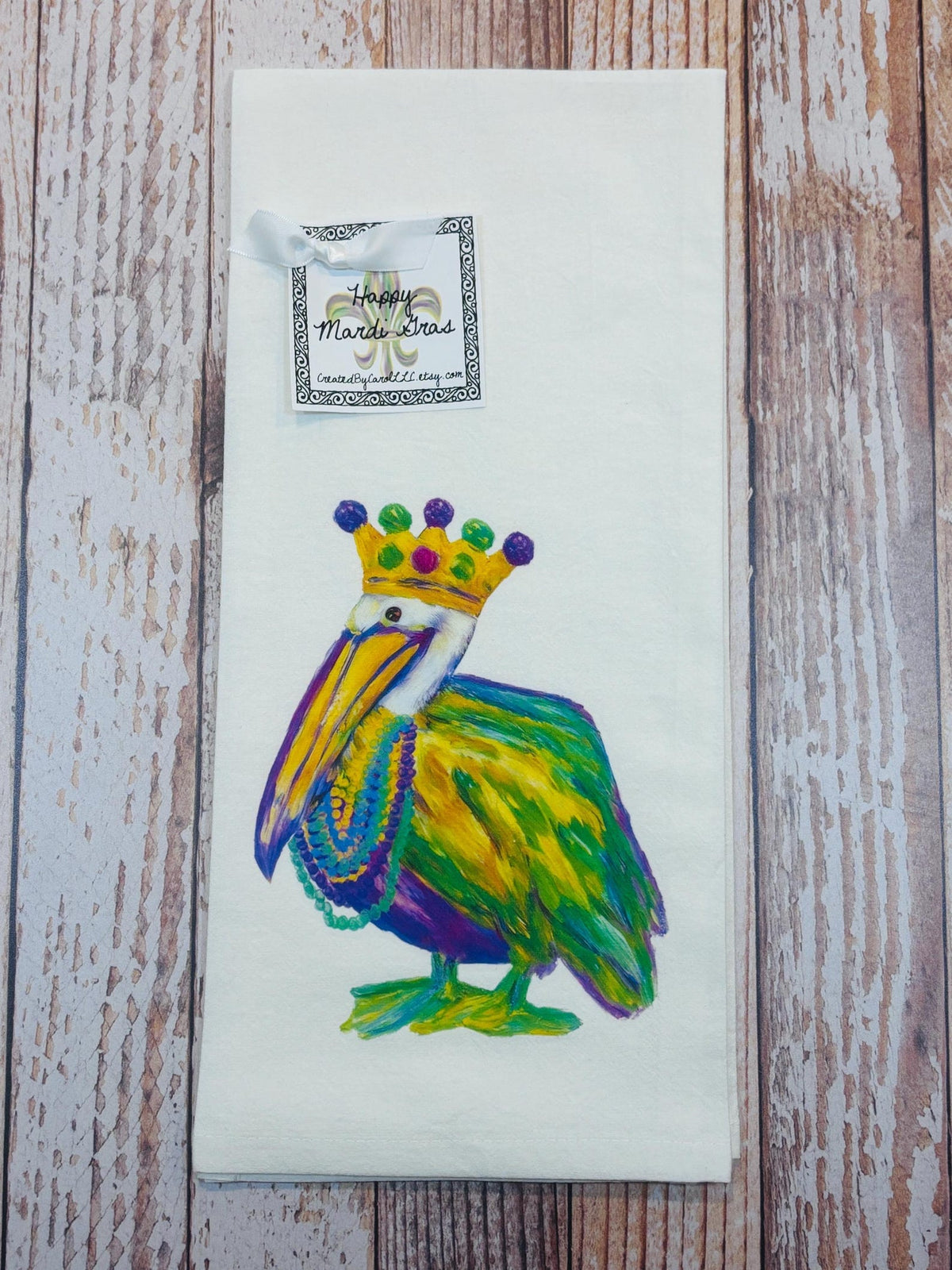 mardi gras watercolor pelican kitchen tea towel
