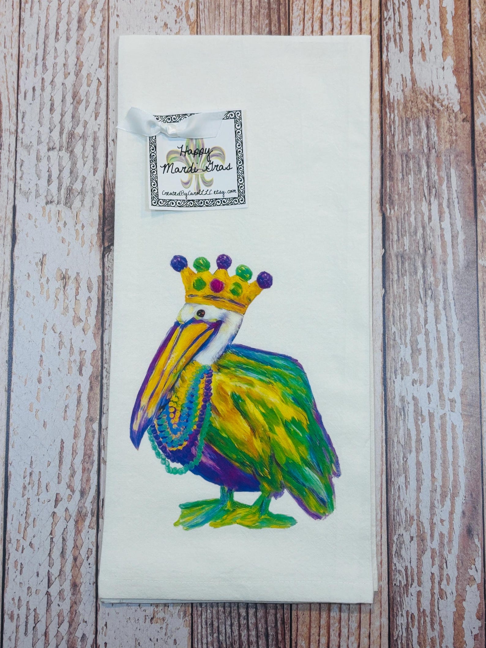 mardi gras watercolor pelican kitchen tea towel