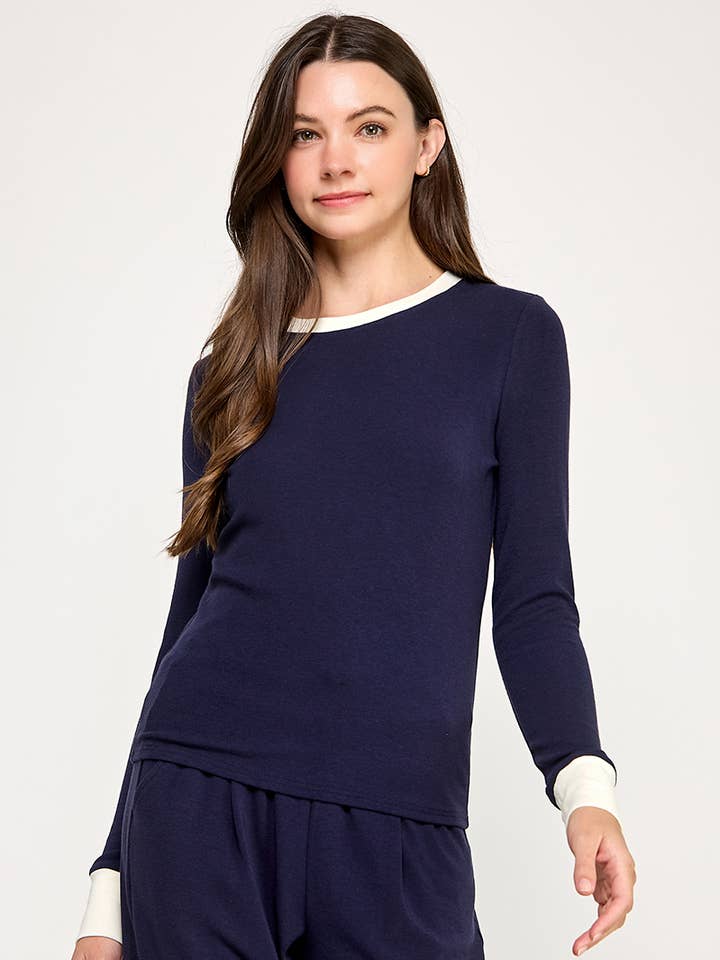 long sleeve navy top with white trim