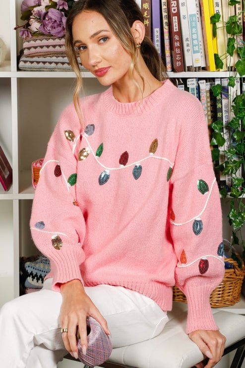 pink christmas light sweater