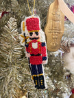 red hat nutcracker ornament