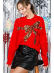red sequin bow sweater