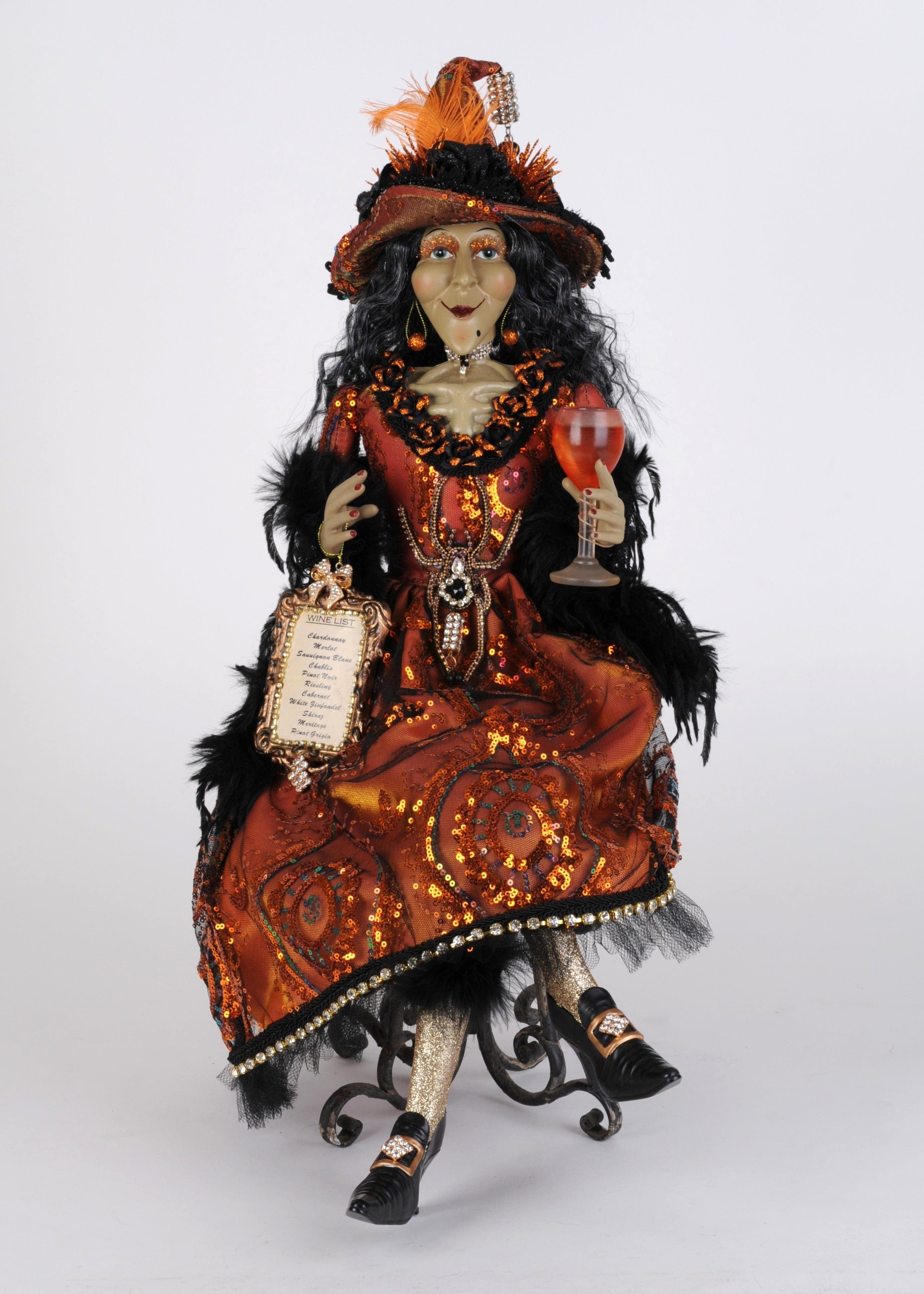 sitting elegant wine witch halloween decor